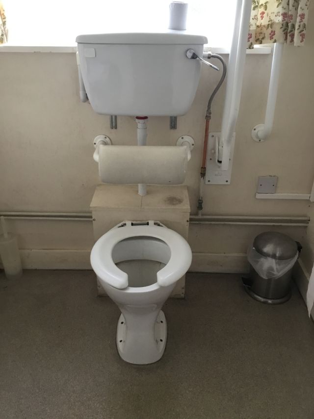 Disabled toilet area before renovation.